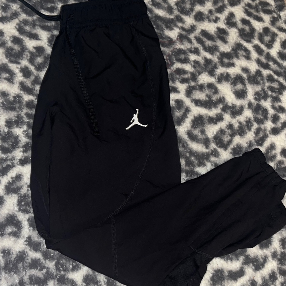 Black JORDAN track pants (zippers on bottom)